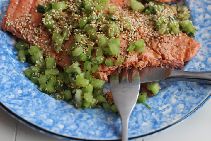 This March 16, 2015 photo shows grilled coho salmon with sesame celery relish in Concord, NH.