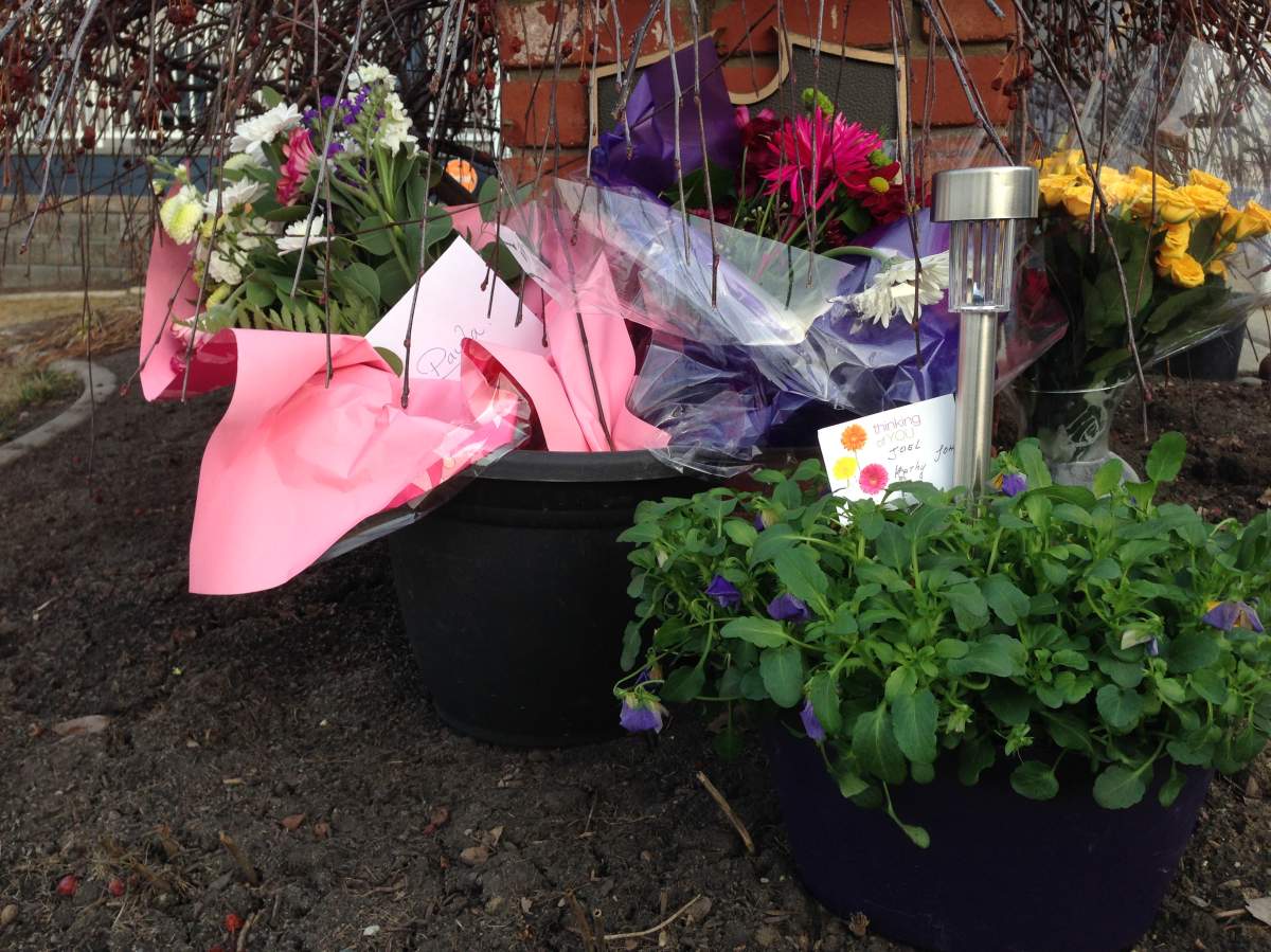 A memorial outside the Sherwood Park home where Paula Stiles lived with her three children.