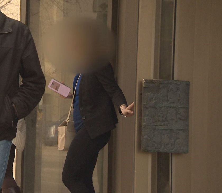 Woman who pleaded guilty to killing two girls in a crash on Bishop Grandin Boulevard in 2010, when she was 17 leaves courthouse Wednesday.