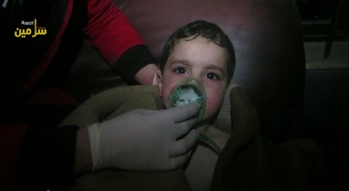 Video from local media activists in Syria's Idlib governate shows a child being treated after a purported chlorine gas attack on March 16, in the town of Sarmeen. 