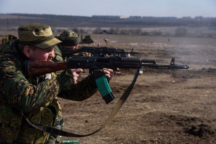 Pro-Russian rebels participate in a military training exercise near Yenakiyeve, in the Donetsk region of eastern Ukraine, in March 2015.