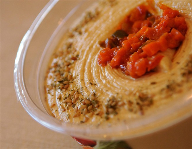 Sabra Dipping Co. on Wednesday, April 8, 2015 announced it is voluntarily recalling about 30,000 cases of Sabra hummus sold in the U.S. due to a possible Listeria contamination. 