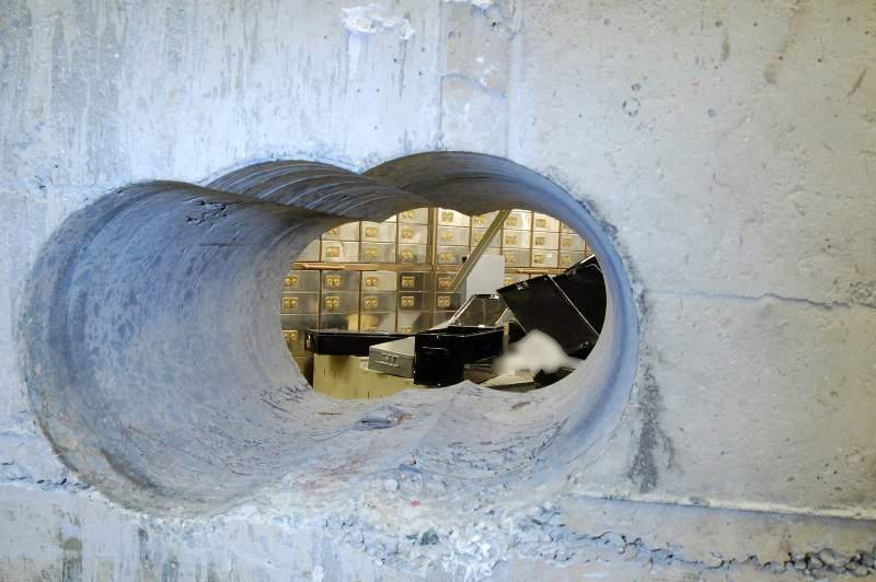 London police say burglars drilled a hole 50 centimetres deep, 25 cm high, and 45 cm wide; and sits 89 cm from the floor.