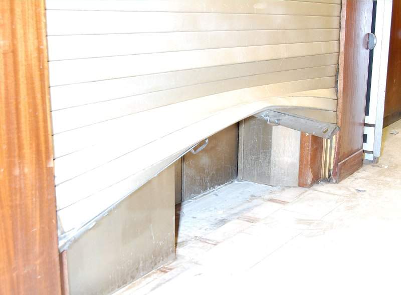 Thieves forced open the shutter doors into the basement to reach the vault.