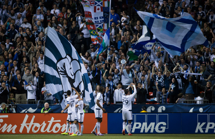 Vancouver Whitecaps' Octavio Rivero (29), of Uruguay, and his teammates celebrate his goal against the Los Angeles Galaxy during the second half of an MLS soccer game in Vancouver, B.C., on Saturday April 4, 2015. 