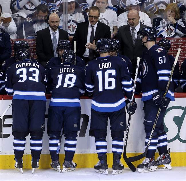 Winnipeg Jets head coach Paul Maurice instructs the team during a timeout while playing against the Anaheim Ducks during the third period of game three.