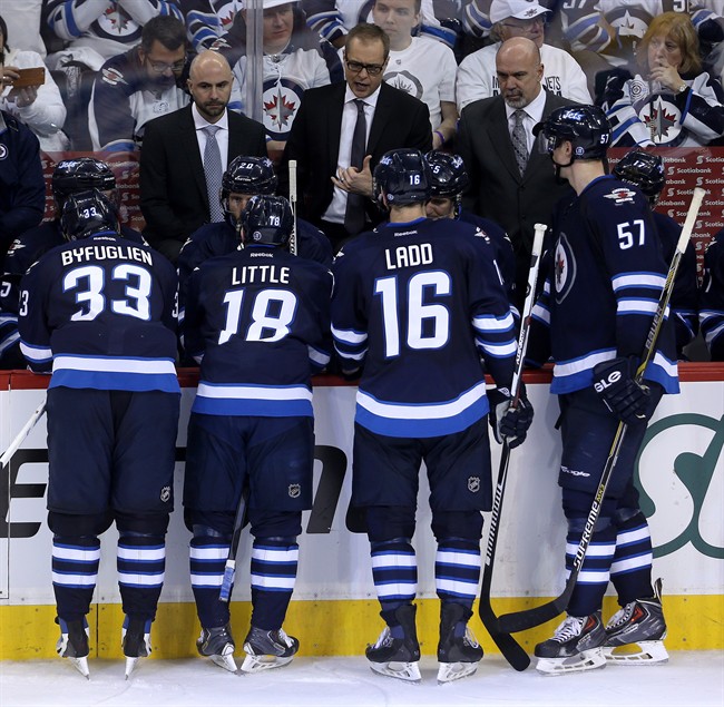 Winnipeg Jets head coach Paul Maurice talk to the team during a timeout while playing  the Anaheim Ducks in the playoffs.