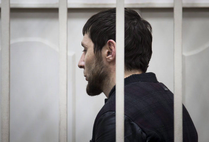 Zaur Dadaev, one of five suspects in the killing of Boris Nemtsov stands in a court room in Moscow, Russia, Sunday, March 8, 2015.