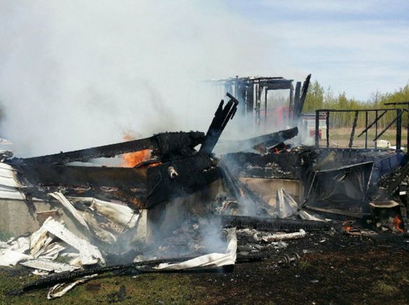 House explosion and fire at home on Paul Band, May 11, 2015.