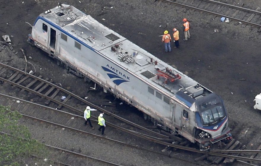 Emergency personnel work at the scene of a deadly train wreck in Philadelphia.