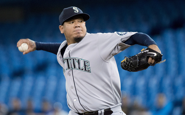 Seattle Mariners starting pitcher Felix Hernandez works against the Toronto Blue Jays during first inning AL baseball action in Toronto on Friday, May 22, 2015.