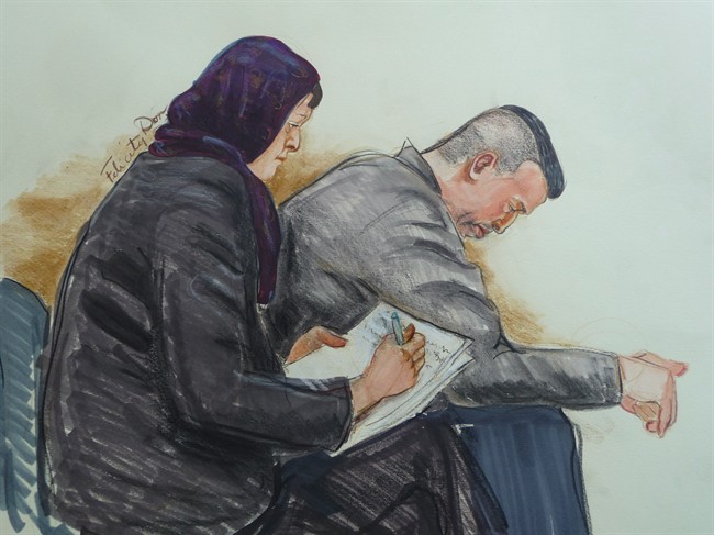 John Nuttall and Amanda Korody, accused of conspiracy to commit murder, placing an explosive in a public place, and possession of an explosive substance, in connection with the alleged plan set for Canada Day 2013, are seen in an artist's sketch at court in Vancovuer on Friday, May 29, 2015. A judge has instructed a jury in the case that motive is key to deciding whether they are guilty of the terrorism allegations.