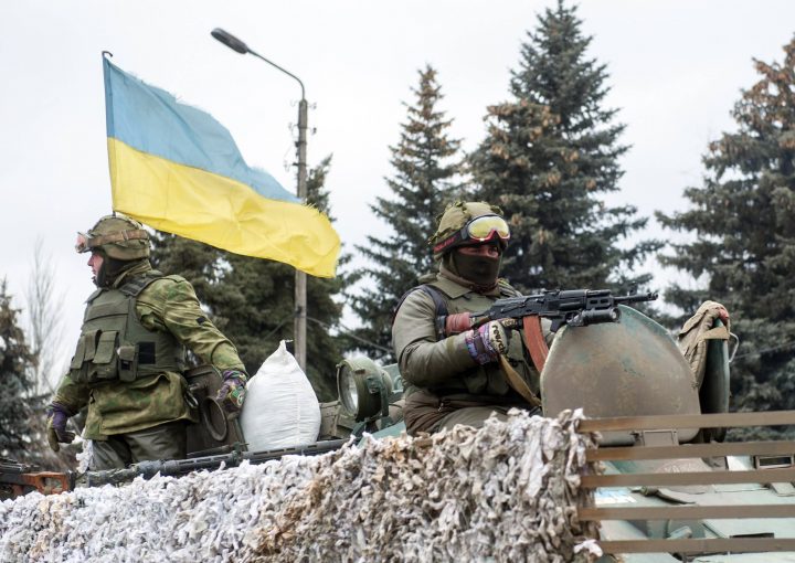 Ukrainian servicemen patrol near the eastern Ukrainian town of Debaltseve, in the region of Donetsk, on February 8, 2015.