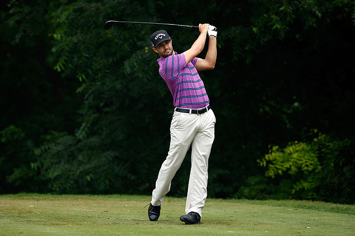 Adam Hadwin hits a shot from the 6th tee during the third round of the Crowne Plaza Invitational at the Colonial Country Club on May 23, 2015 in Fort Worth, Texas.