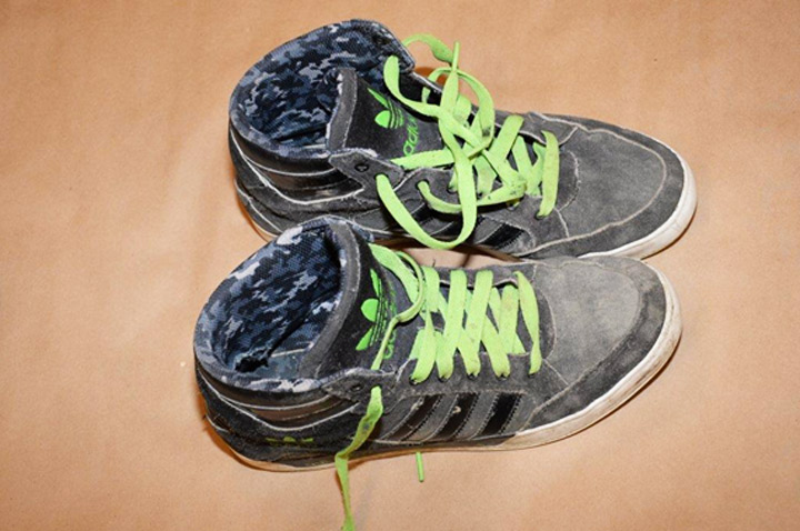 Prince Albert police release photo of victim’s shoes after an unknown man was found unresponsive Saturday.