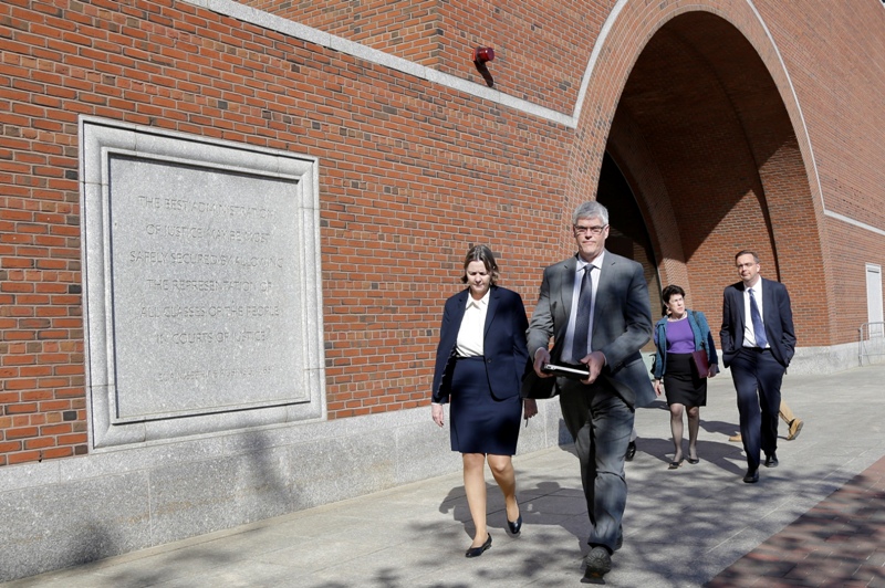 Members of the defense team for convicted Boston Marathon bomber Dzhokhar Tsarnaev, from left, Judy Clarke, Timothy Watkins, Miriam Conrad and William Fick leave federal court in Boston, Thursday, May 14, 2015.