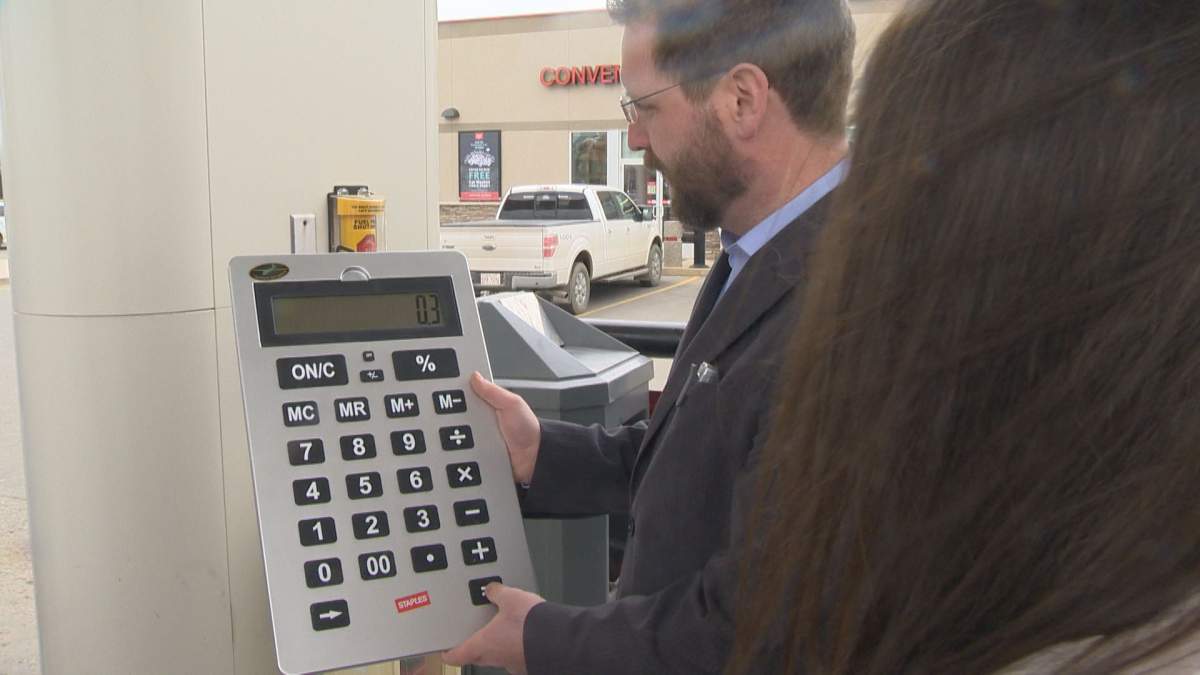 Canadian Taxpayers Federation representatives unveil gas taxes.