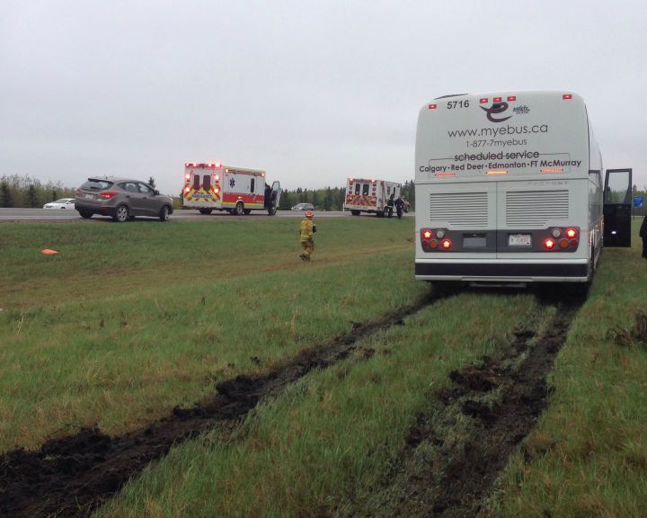 A passenger bus hit the ditch on the QEII south of Edmonton Saturday, May 16, 2015.