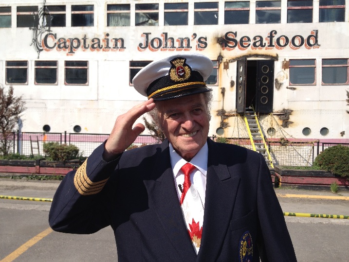 Former Captain John’s owner Ivan “John” Letnik salutes goodbye.