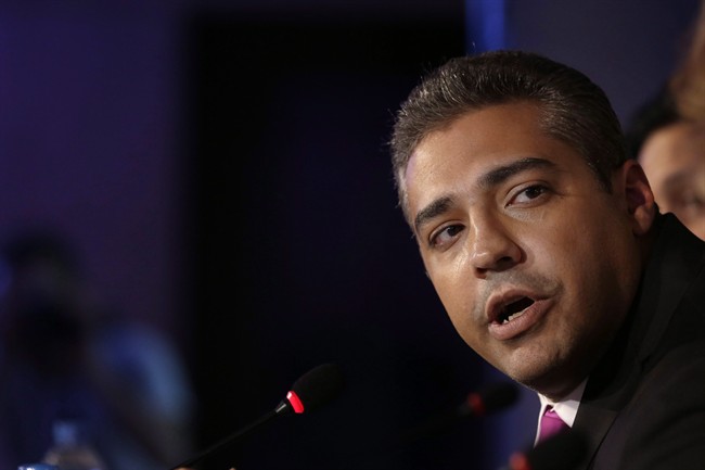 Al-Jazeera English's former acting bureau chief, Canadian-Egyptian journalist Mohammed Fahmy, speaks during a press conference in Cairo, Egypt, Monday, May 11, 2015.