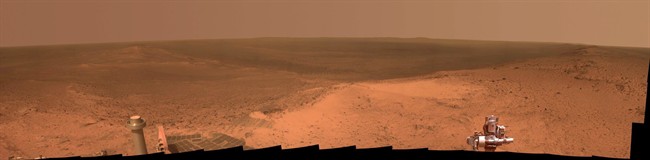 This Jan. 6, 2015 panorama provided by NASA of a Martian hilltop was taken by the NASA rover Opportunity. Future space travel beyond Earth -- to Mars and beyond -- will be one of the hot topics at a five-day international space development conference in Toronto this week.