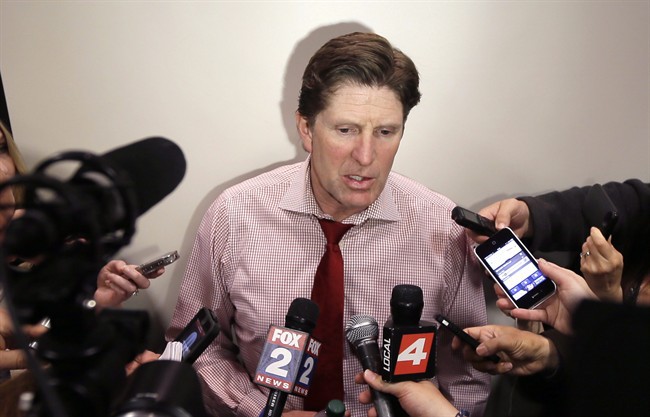 Detroit Red Wings head coach Mike Babcock addresses the media at Joe Louis Arena in Detroit, Tuesday, April 29, 2014. A person familiar with the discussions tells The Associated Press that Babcock is in contract talks with the Buffalo Sabres to potentially become their next head coach.