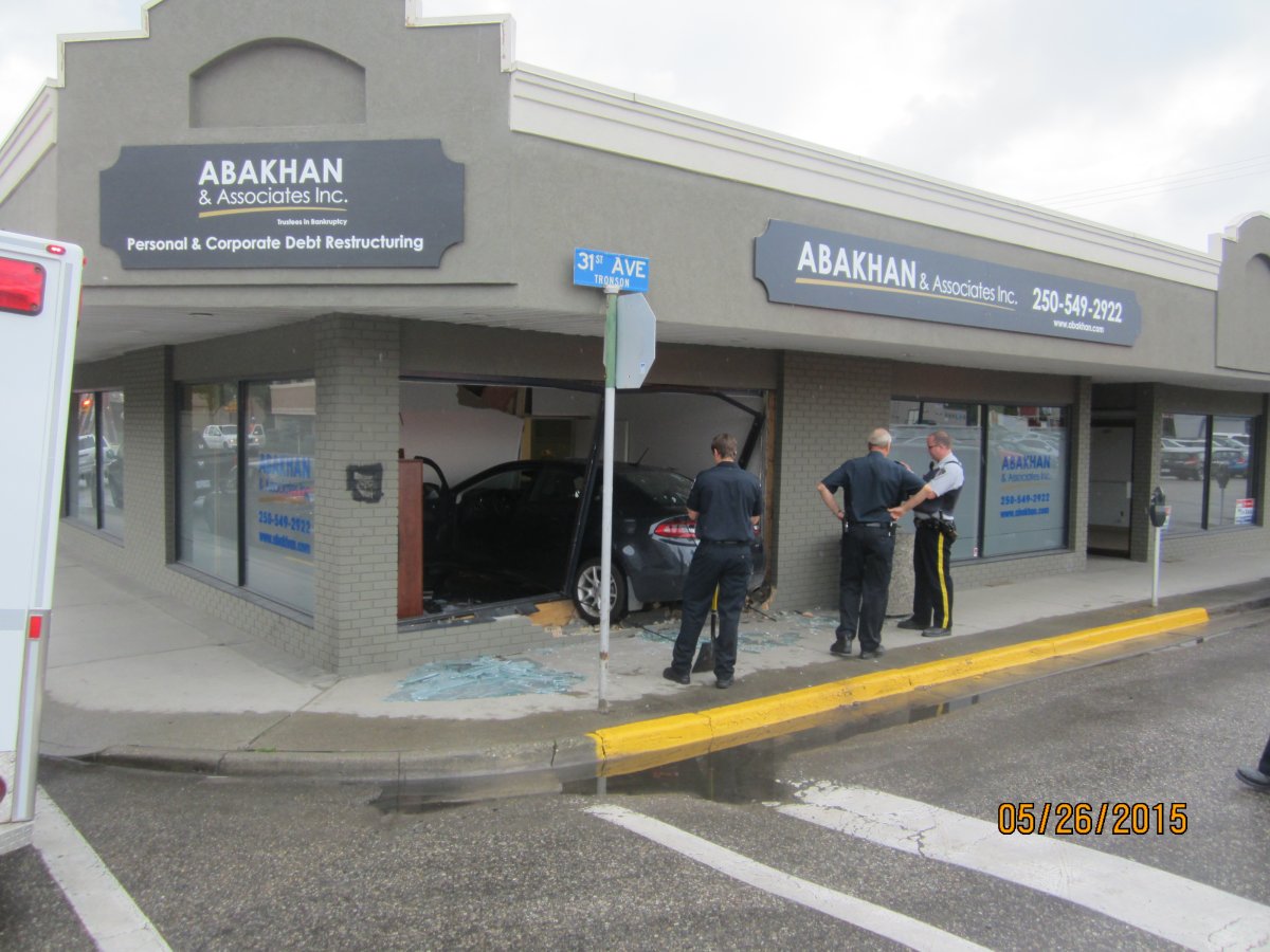 Driver slams into Vernon business, narrowly misses hitting people - image