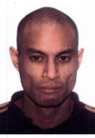 Darwin Lescano has not been located and is believed to be a suspect in the death of Redelma Belisario.
