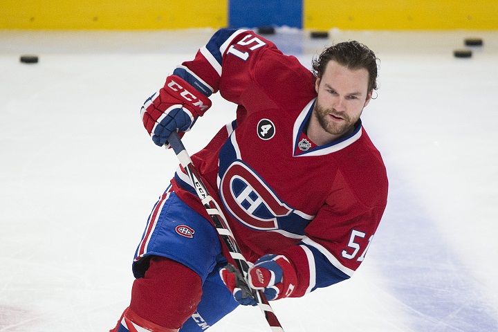 Montreal Canadiens' David Desharnais skates during warm up prior to an NHL game against the San Jose Sharks in Montreal, Saturday, March 21, 2015. 