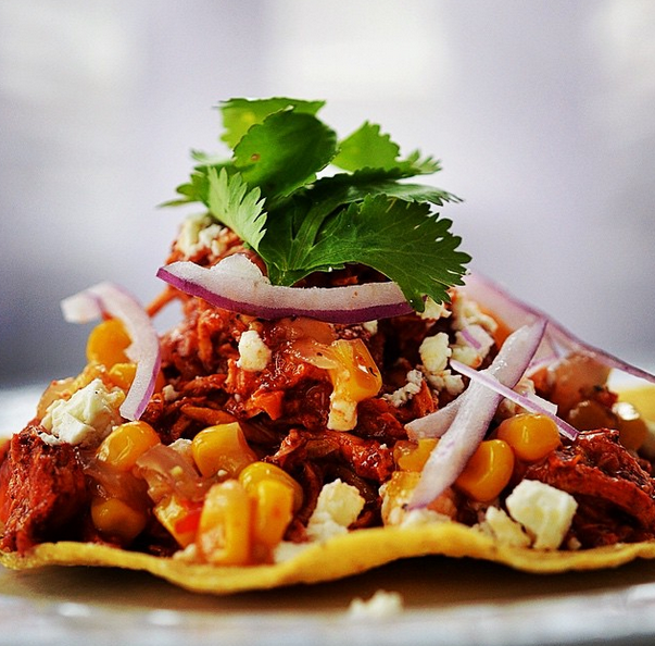 "Inspired by my visit to Mexico, I braised chicken in achiote and we had killer tostadas.".