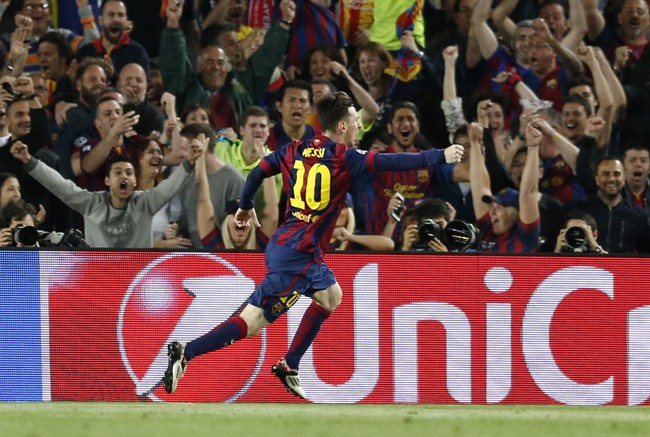 Barcelona's Lionel Messi celebrates after scoring the opening goal during the Champions League semifinal first leg soccer match between Barcelona and Bayern Munich at the Camp Nou stadium in Barcelona, Spain, Wednesday, May 6, 2015.