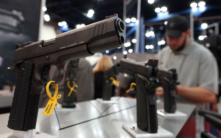 Handguns are displayed during the 2013 NRA Annual Meeting and Exhibits at the George R. Brown Convention Center on May 5, 2013 in Texas.