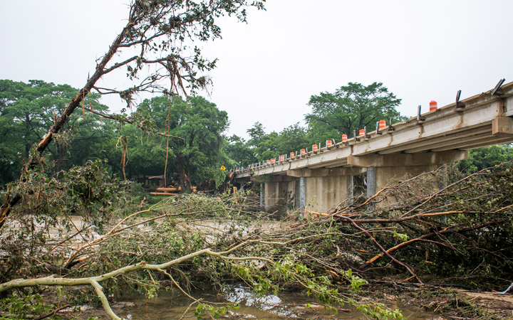 Debris is strewn near the Blanco River May 26, 2015 in Wimberley, Texas. 