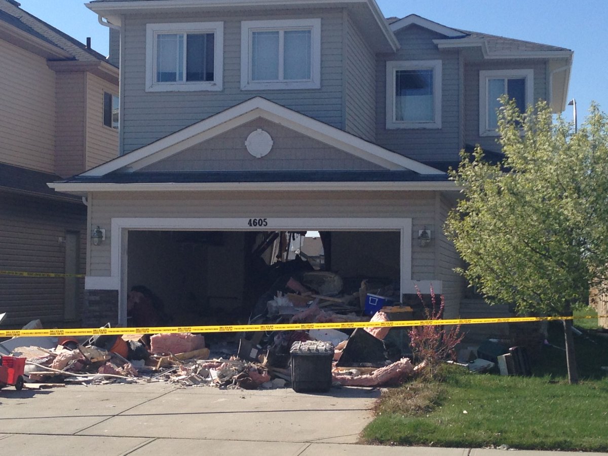 Driver charged after SUV crashes through Edmonton home Edmonton