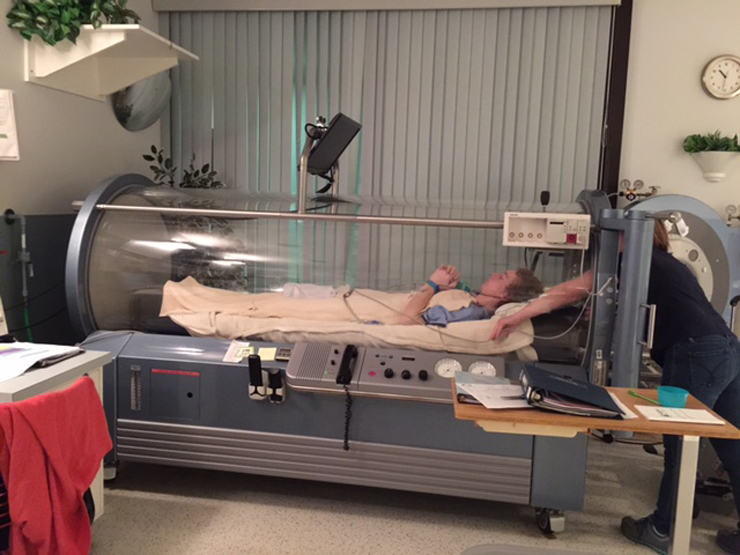 15-year-old Delan Robertson undergoes life-saving treatment in the hyperbaric chamber in Moose Jaw.