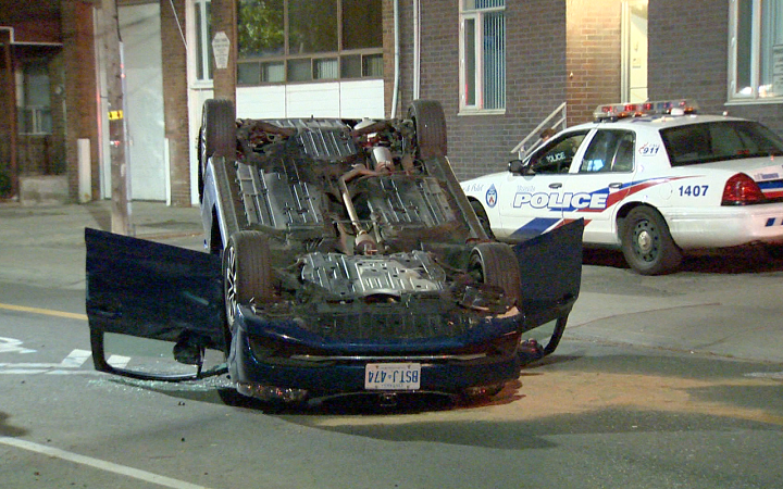 A car flipped over after a crash on Richmond St. on May 26, 2015.