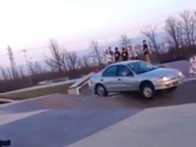 A car bounces over obstacles at Michael Komenda Memorial Skatepark in Winnipeg on Tuesday in an image from video posted on Facebook by Brendon Gladu.