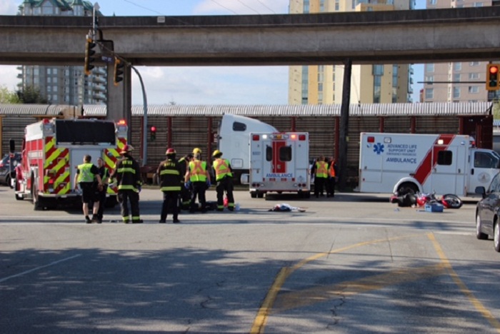 Crews investigate a fatal collision at the intersection of 12th Street and Stewardson Way on May 1, 2015. 