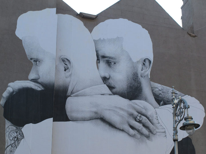 In this Thursday, April 23, 2015 photo, a gay rights mural decorates the side of a building in central Dublin, Ireland. 
