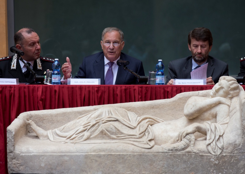 The cover of a second century Roman marble sarcophagus, representing a woman, is displayed to the media during a press conference, in Rome, Tuesday, May 26, 2015.