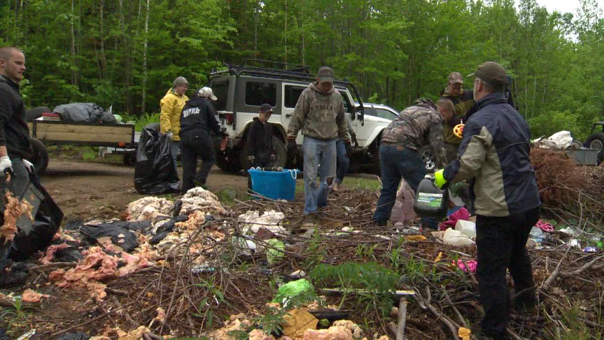 NB Jeep Club cleans up illegal dumping area in Fredericton. 