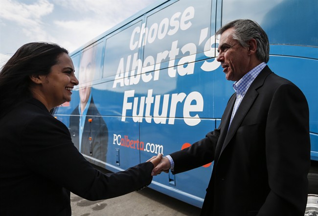 Alberta PC Party Leader Jim Prentice greets a supporter during a campaign stop in Calgary, Alta., Saturday, May 2, 2015. 