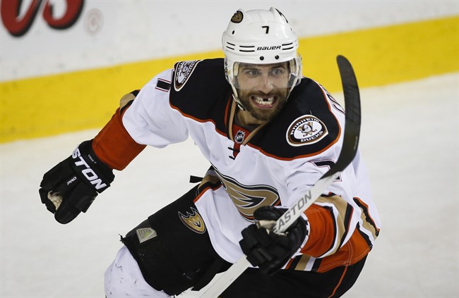 Anaheim Ducks' Andrew Cogliano celebrates his tying goal during second period NHL second round game four playoff hockey action against the Calgary Flames in Calgary, Friday, May 8, 2015.