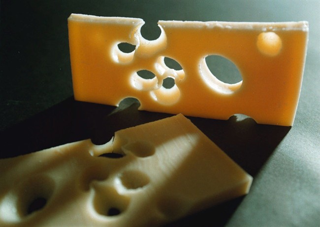 The mystery of the disappearing holes in the famous Swiss cheese has been solved: the milk is too clean. A Swiss agricultural institute discovered that tiny pieces of hey dust are responsible for the famous holes in cheeses like Emmentaler or Appenzeller as they said in a statement Thursday, May 28, 2015.