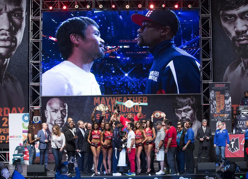 Floyd Mayweather Jr and Manny Pacquaio face off at Saturday's weigh-in.