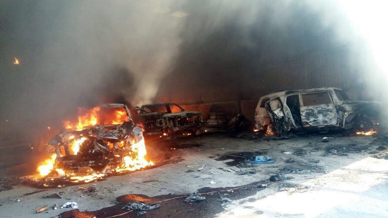 Vehicles burn, that authorities say caught fire during a gunbattle, in a warehouse at Rancho del Sol, near Ecuanduero, in western Mexico, Friday, May 22, 2015. At least 43 people died Friday in what authorities described as a fierce, three-hour gunbattle between federal forces and suspected drug gang gunmen at the ranch. 