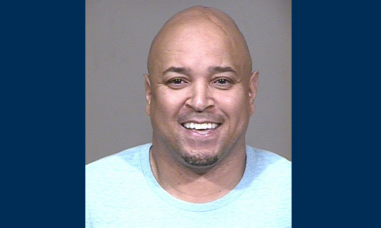 This photo provided by Scottsdale Police Department shows Chris Gatling. The former NBA All-Star has been arrested in Scottsdale, Ariz., on allegations he ran a massive online fraud scheme using credit cards of people from across the country.