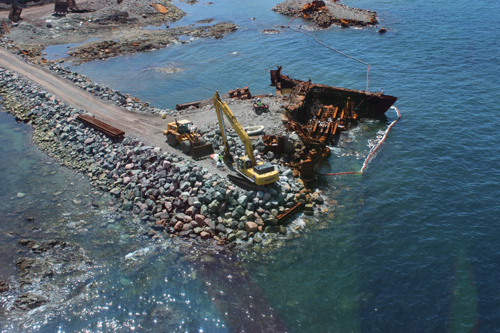 The Nova Scotia government says about 800 litres of oil was collected after a leak from the wreckage of the MV Miner off Scaterie Island on Sunday.