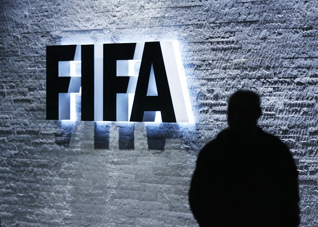 Interpol added six men with ties to FIFA to its most wanted list on Wednesday.