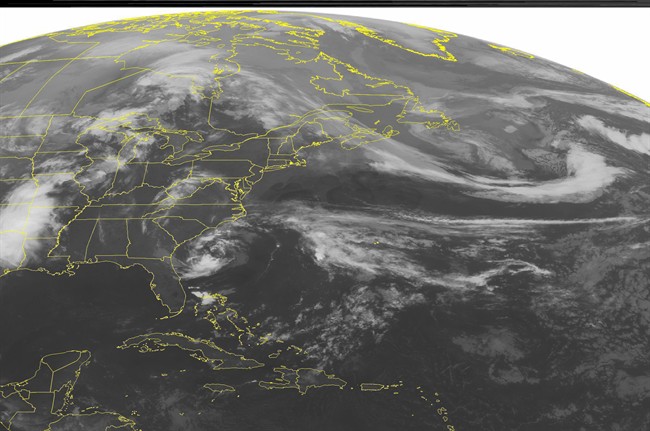 This NOAA satellite image taken Friday, May 8, 2015 at 12:45 AM EDT shows subtropical storm Ana along the South Carolina coast producing scattered thunderstorms off shore with rain showers along the coast from North Carolina to Florida. A dry line in the Central and Southern Plains has developed a strong line of thunderstorms accompanied with heavy rain showers. Low pressure and a cold front move into the Great Lakes bringing rain with a few thunderstorms. Stationary front across Northern New England is also producing rain showers in Northern Maine.